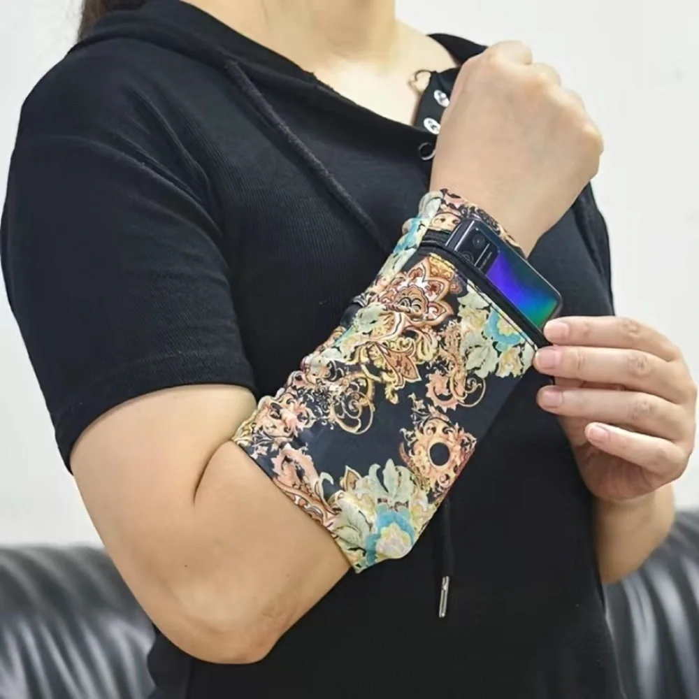 RUNNING phone/key etc bag black floral size small